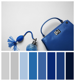 Stylish purse and perfume bottle on light background, flat lay. Color of the year 2020 (Classic blue)