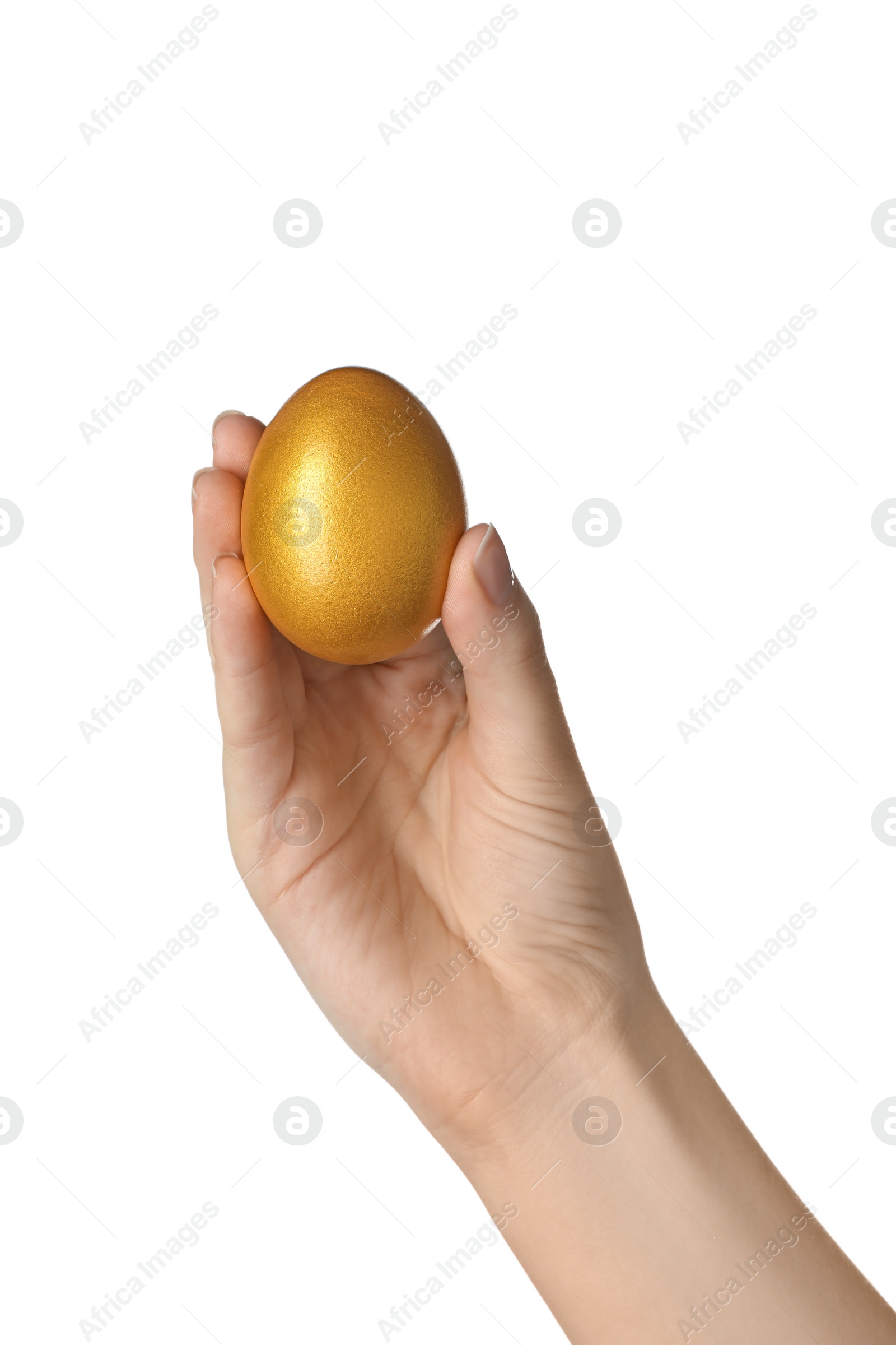 Photo of Woman holding golden egg on white background, closeup