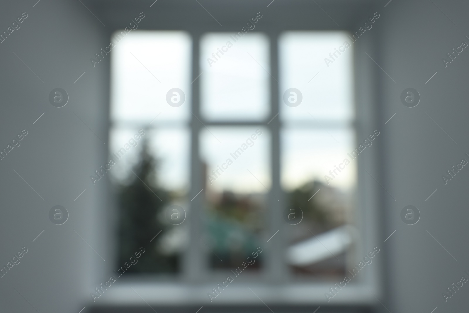 Photo of Blurred view of window in empty renovated room