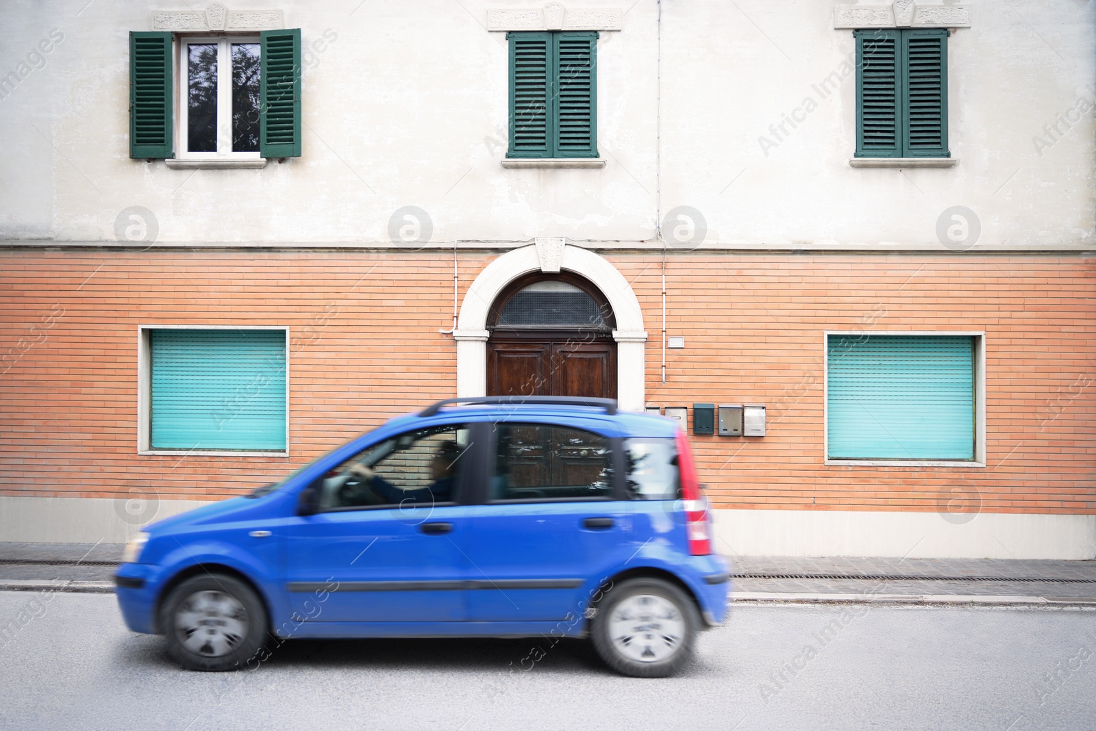 Photo of Beautiful view of moving car and building