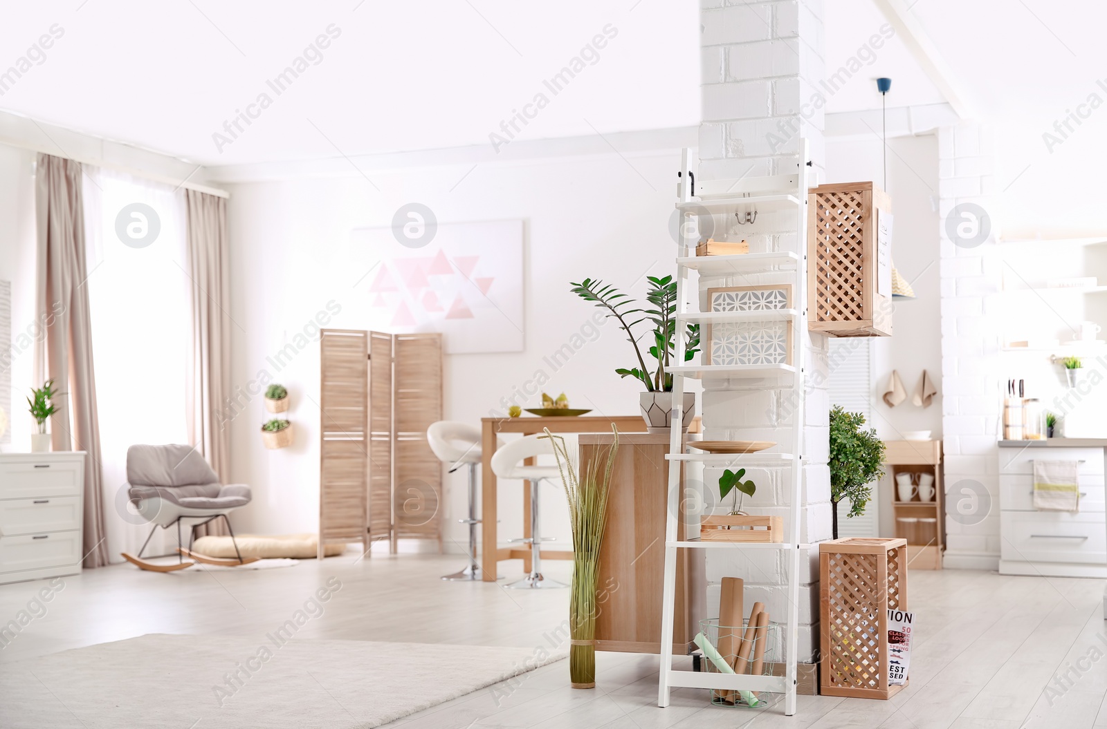 Photo of Modern eco style interior with wooden crates and shelves