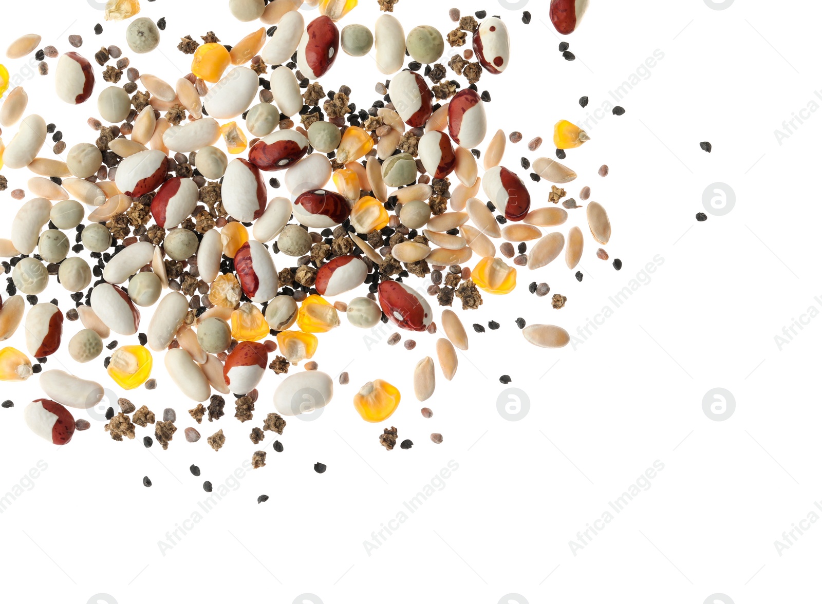 Photo of Mix of vegetable seeds on white background, top view