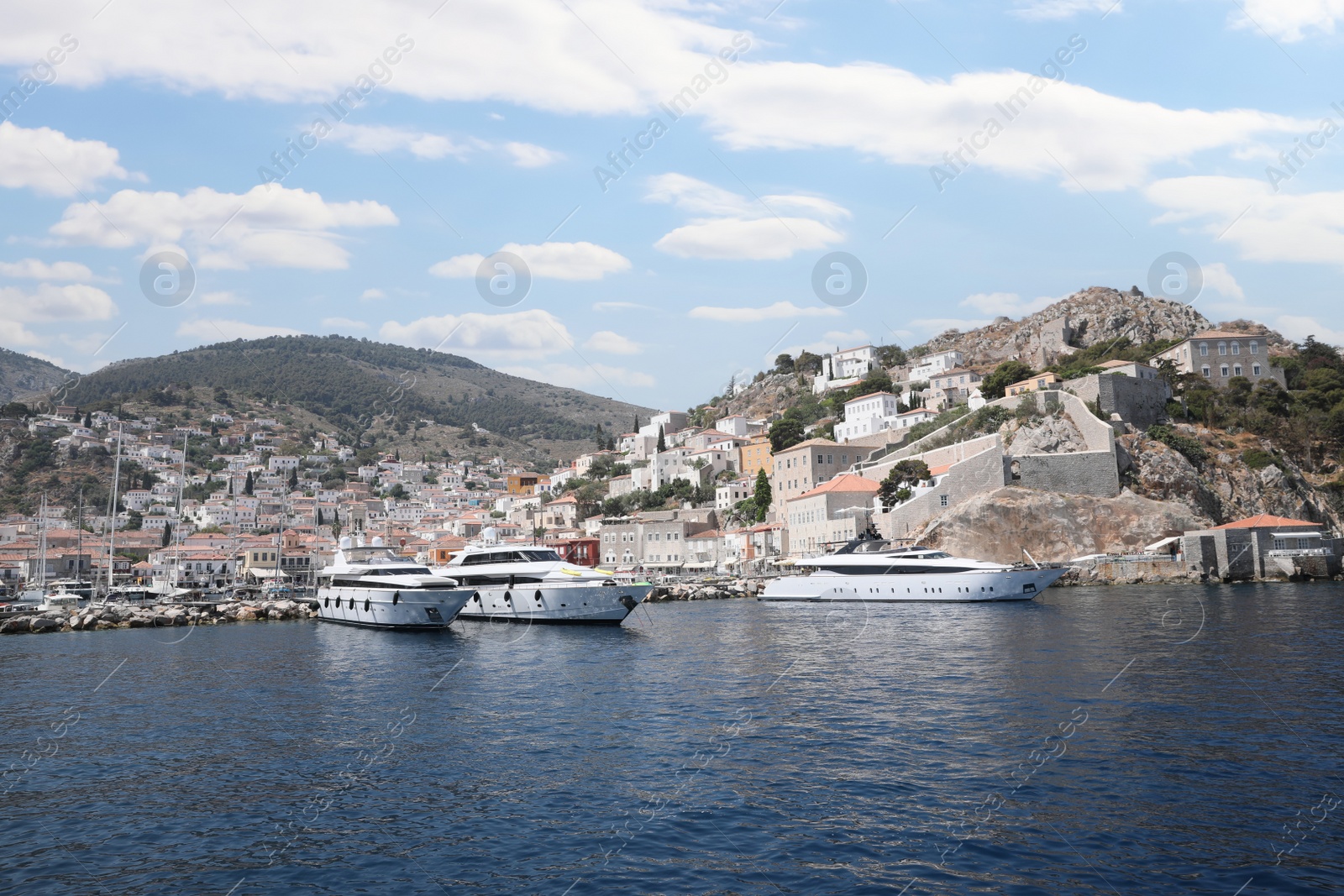 Photo of Beautiful view of sea with boats and coastal city