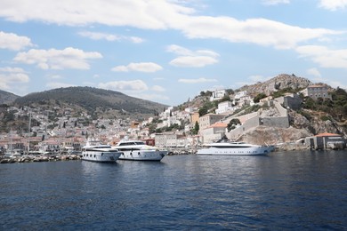 Beautiful view of sea with boats and coastal city