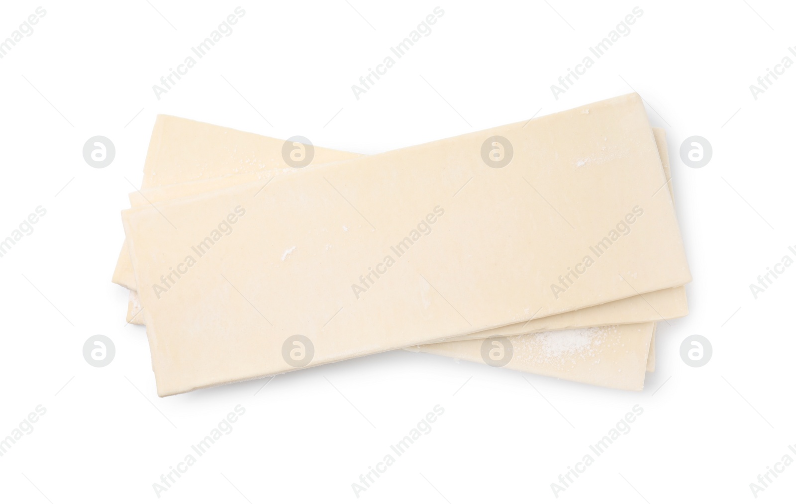 Photo of Raw puff pastry dough isolated on white, top view