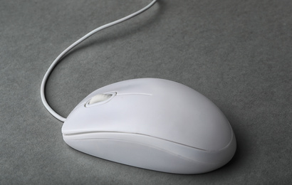 Photo of Modern wired computer mouse on grey background