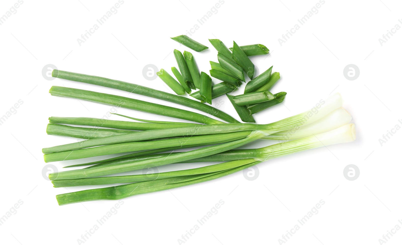 Photo of Fresh green spring onions isolated on white, top view