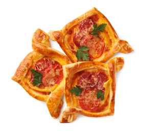 Photo of Fresh delicious puff pastry with cheese, tomatoes and parsley on white background, top view