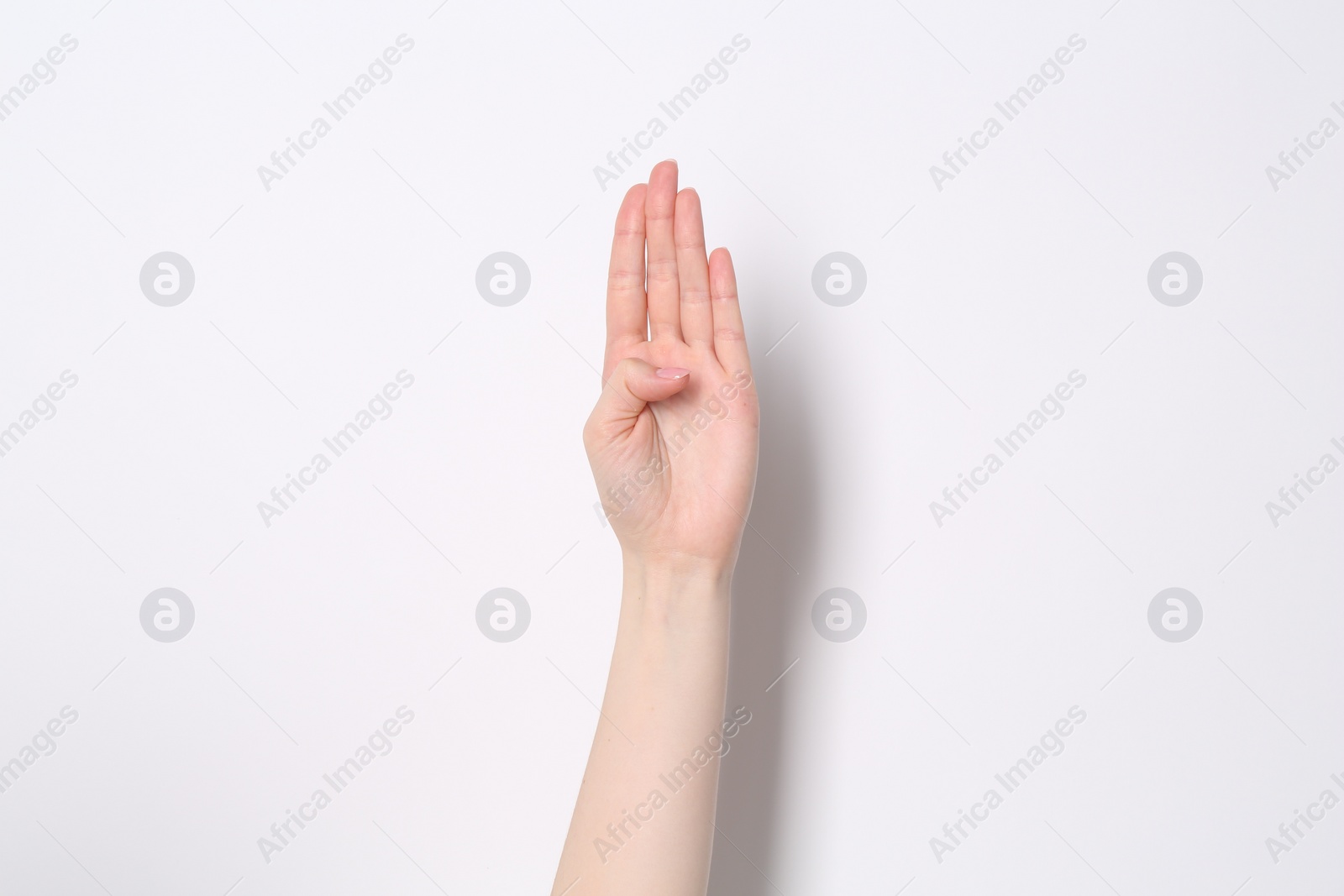 Photo of Woman showing open palm on white background, closeup