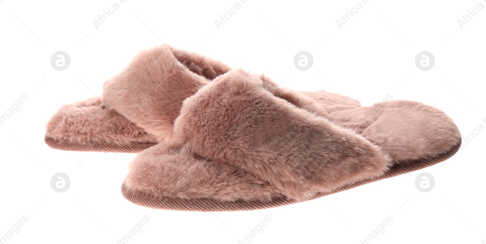 Photo of Pair of stylish soft slippers on white background