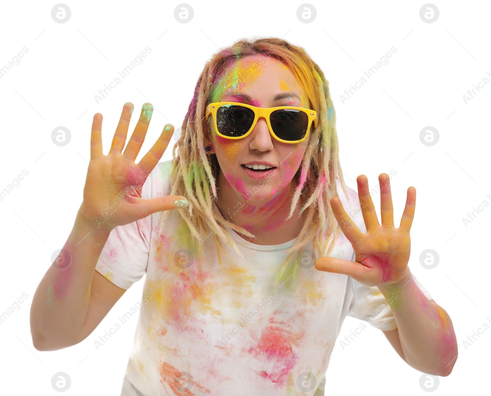 Photo of Woman covered with colorful powder dyes on white background. Holi festival celebration