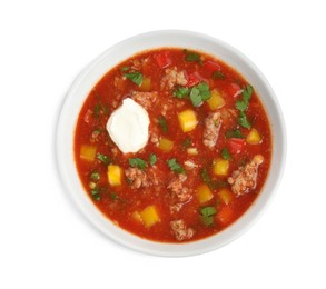 Photo of Bowl of delicious stuffed pepper soup on white background, top view