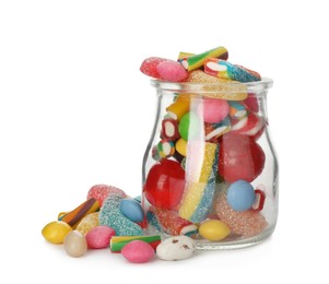 Photo of Glass jar with different candies on white background