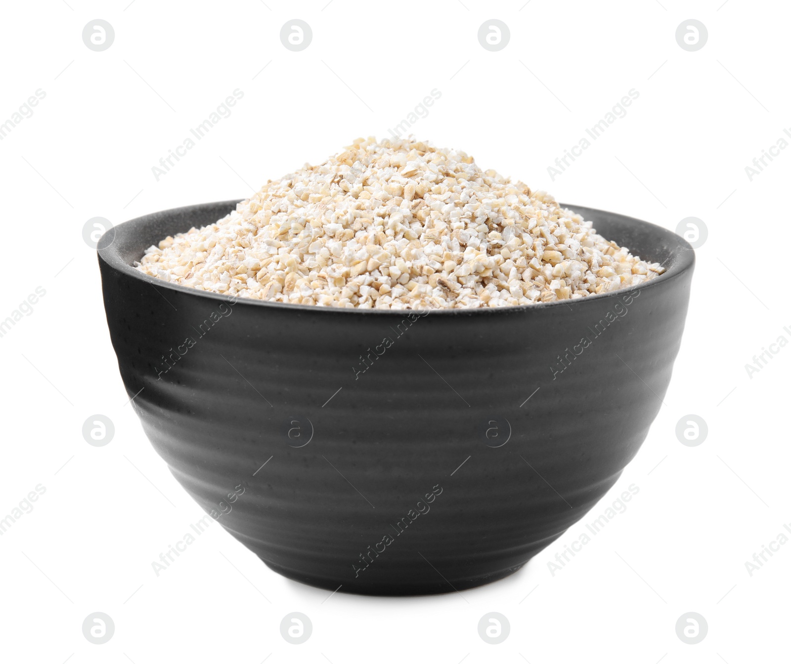 Photo of Dry barley groats in bowl isolated on white