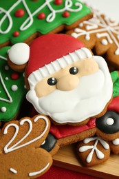 Tasty homemade Christmas cookies on table, closeup