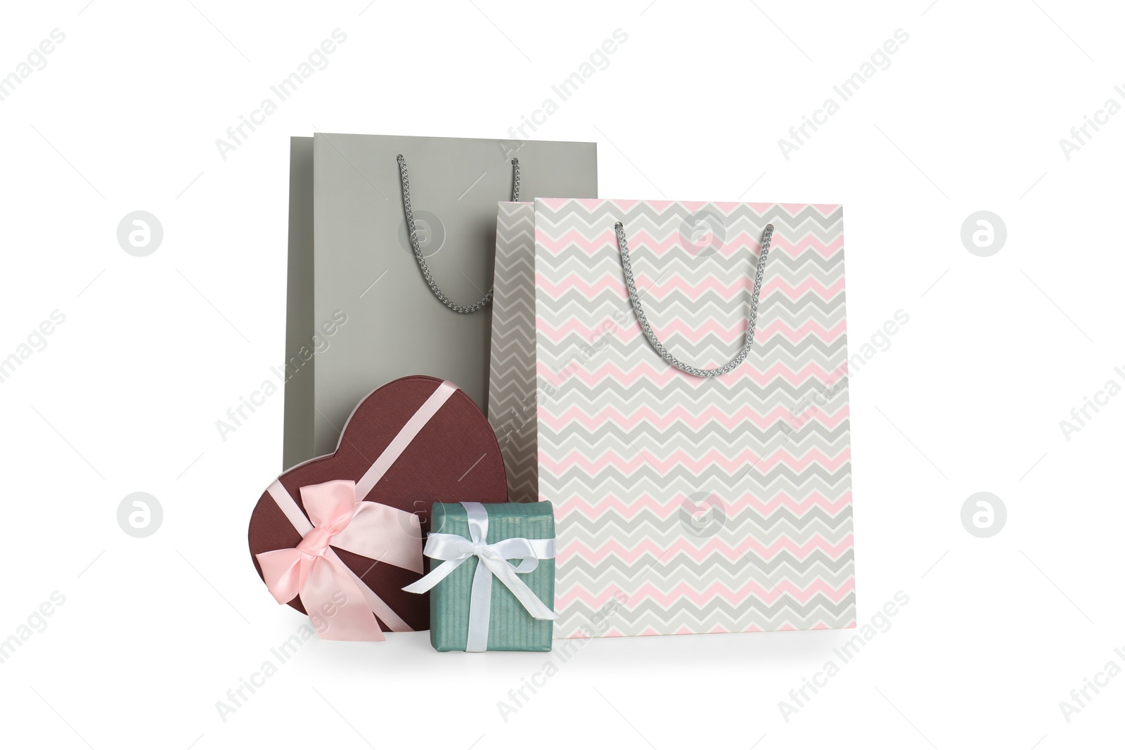 Photo of Paper bags and gift boxes isolated on white