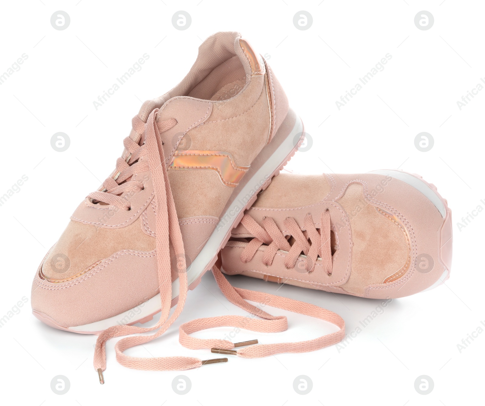 Photo of Stylish pink sneakers with shoelaces on white background