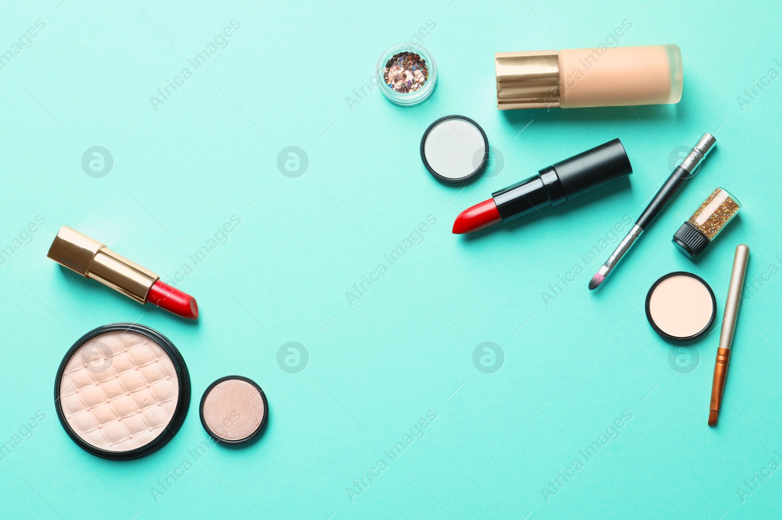 Photo of Flat lay composition with decorative cosmetics on color background