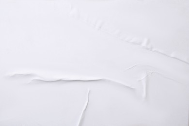 Photo of Texture of white creased paper, closeup view