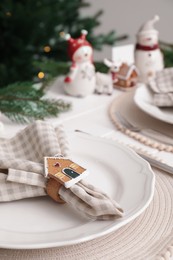 Photo of Luxury place setting with beautiful festive decor for Christmas dinner on white table, closeup