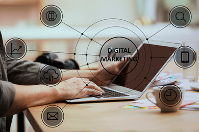 Image of Digital marketing strategy. Man working with laptop in office, closeup