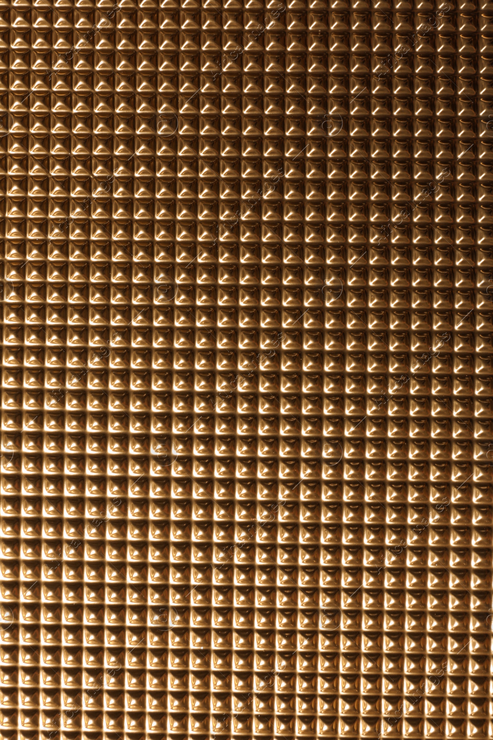 Photo of Textured golden surface as background, top view