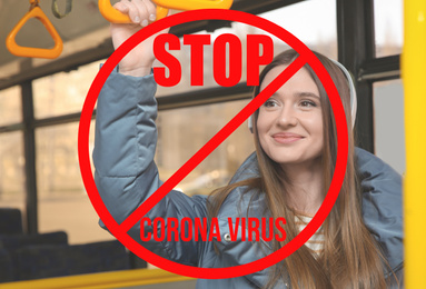 Image of Woman keeping distance in trolleybus. Coronavirus outbreak 