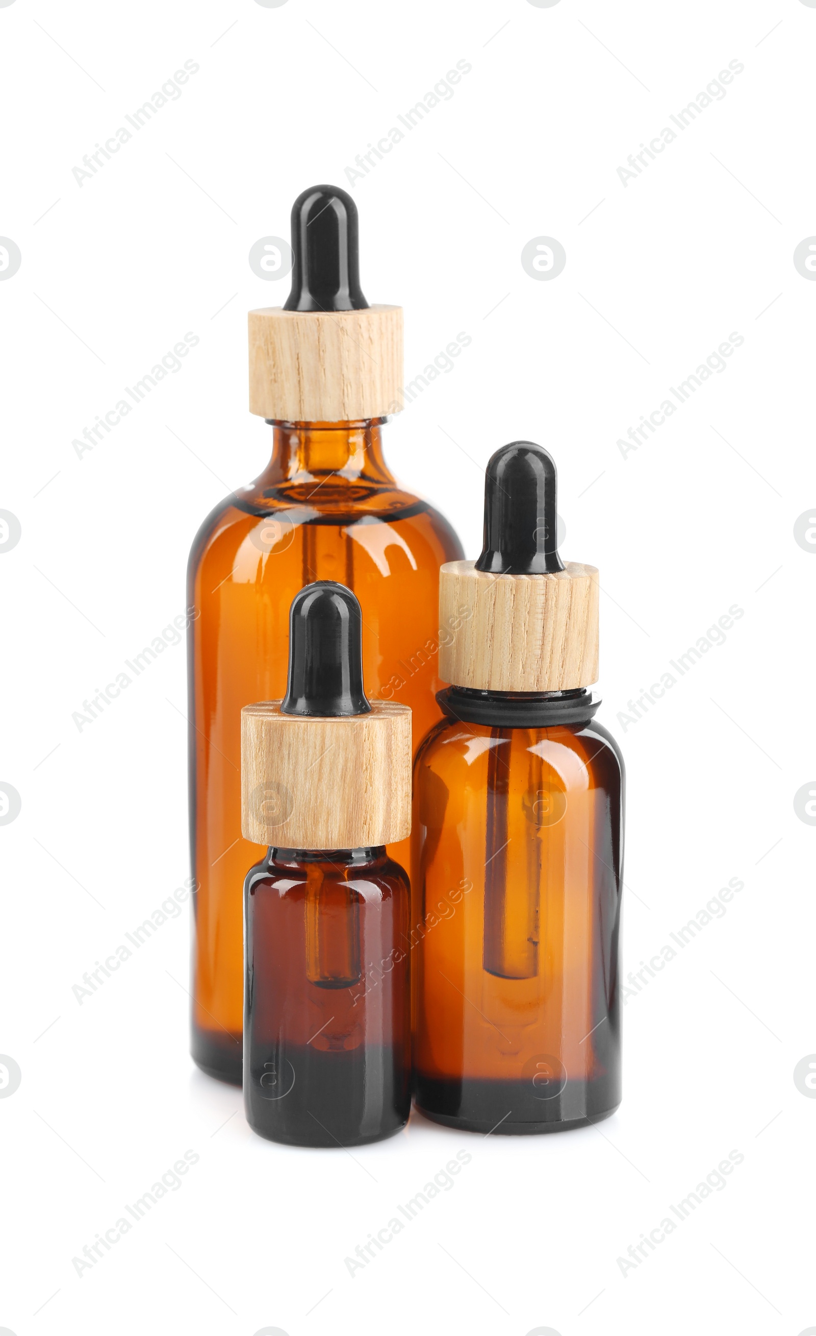 Photo of Glass bottles of tincture isolated on white