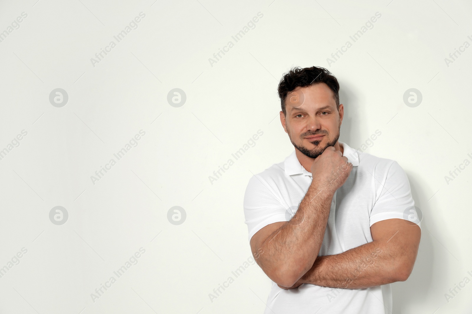 Photo of Portrait of handsome man on white background