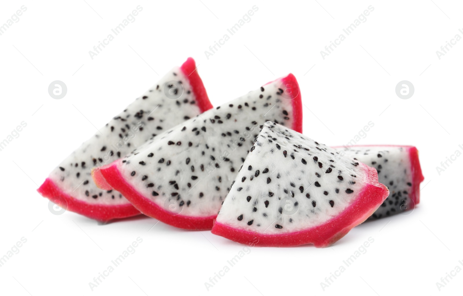 Photo of Slices of delicious pitahaya fruit on white background