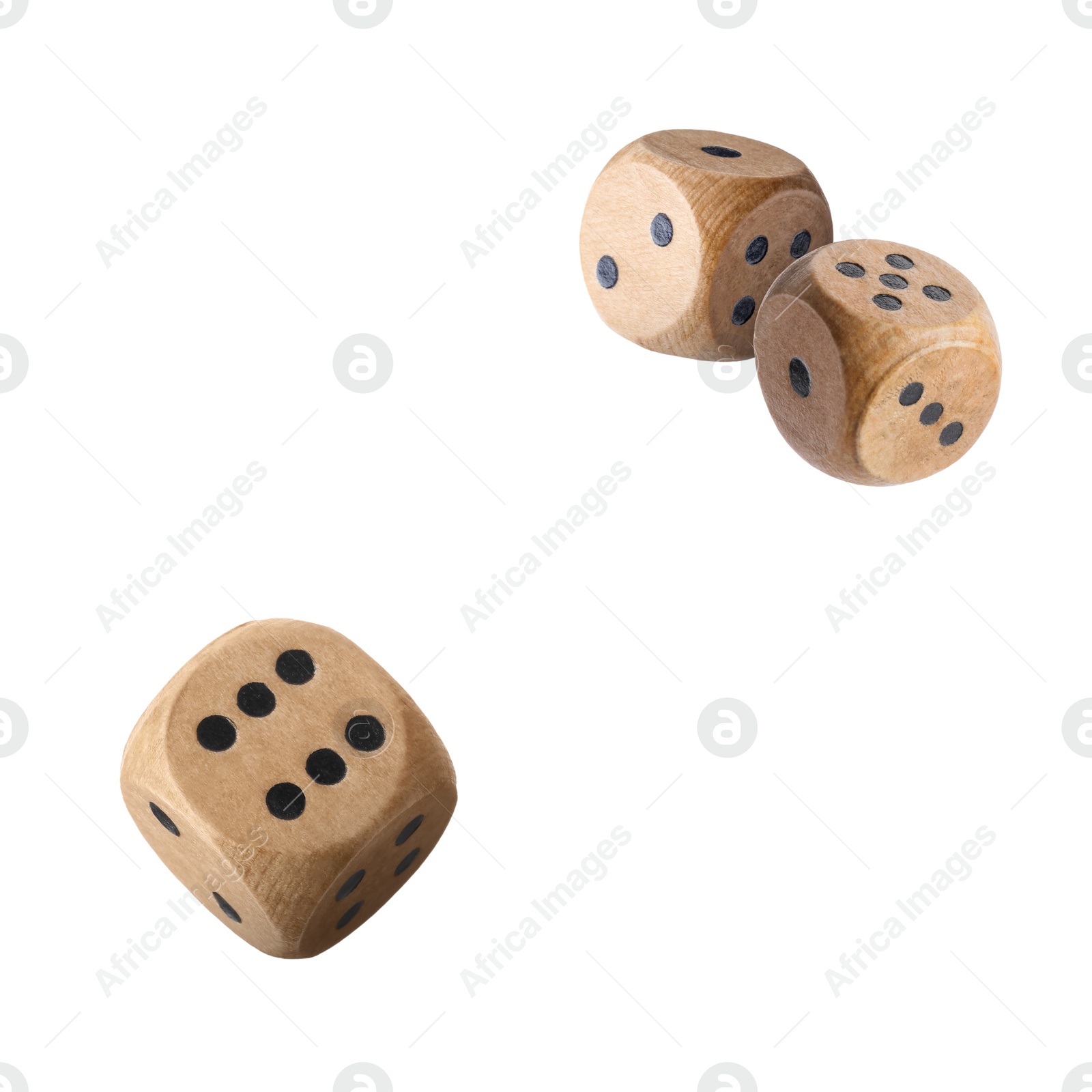 Image of Three wooden dice in air on white background