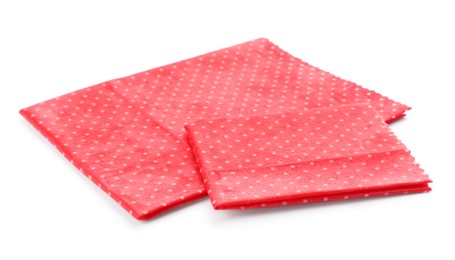 Red reusable beeswax food wraps on white background