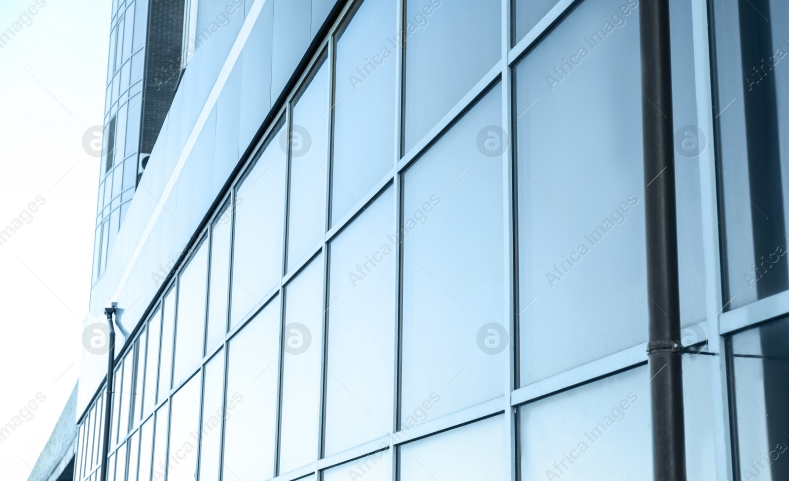 Photo of Modern building with tinted windows. Urban architecture