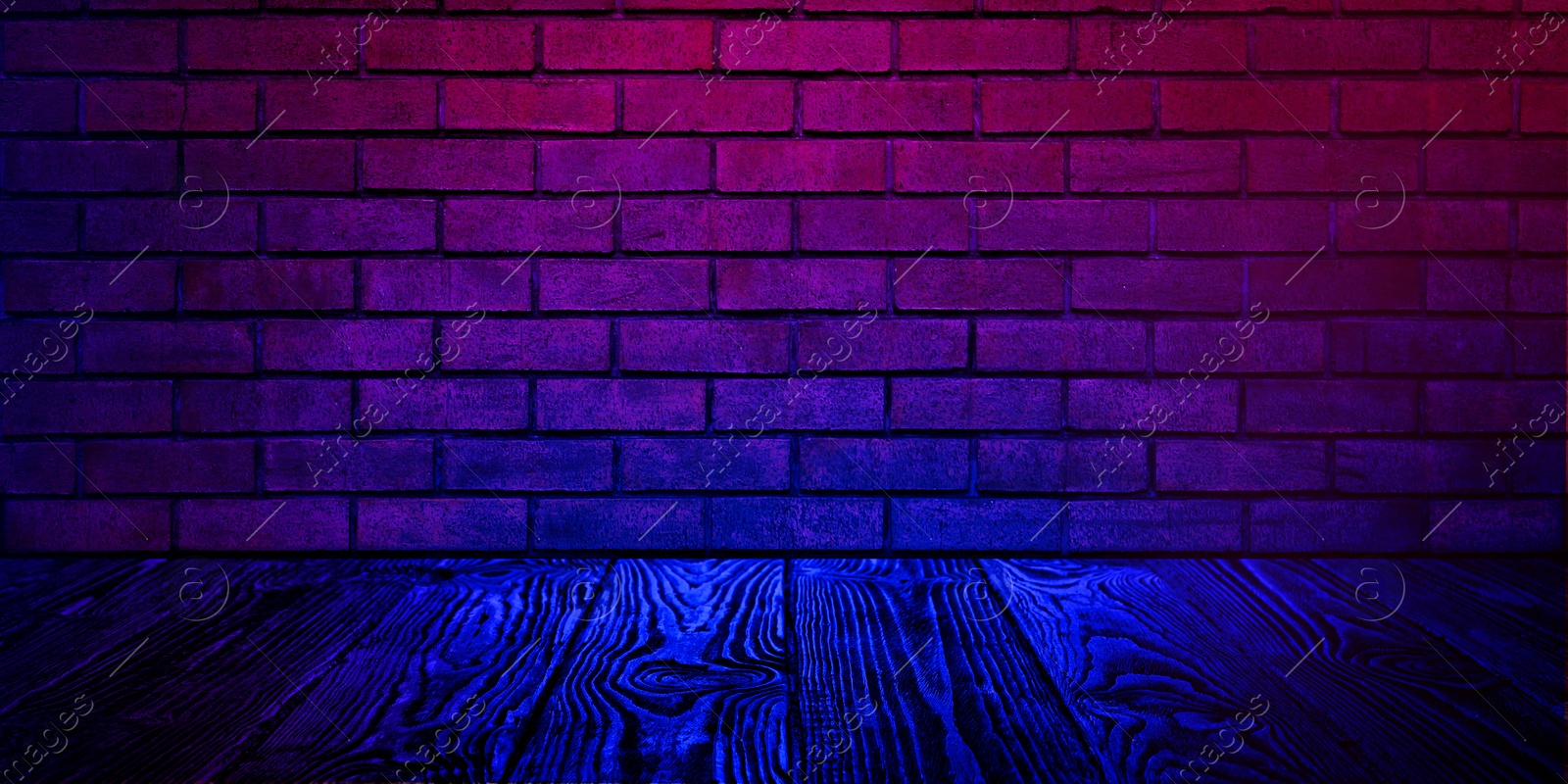 Image of Room with brick wall and wooden floor in neon lights, banner design