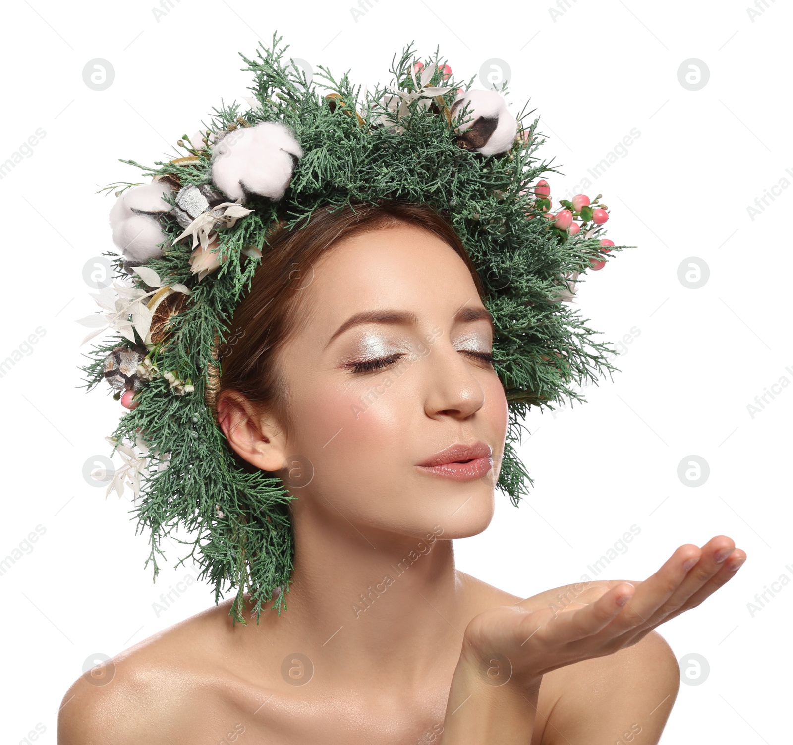 Photo of Happy young woman wearing wreath on white background