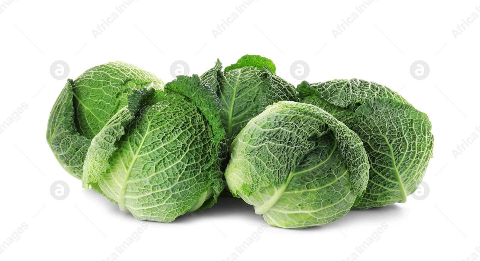 Photo of Fresh green savoy cabbages on white background