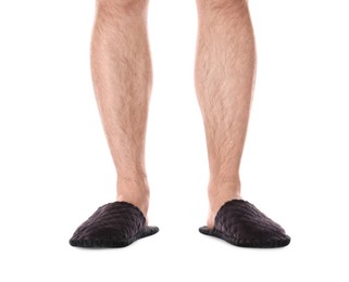 Photo of Man in warm soft slippers on white background, closeup