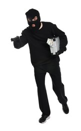 Photo of Thief in balaclava with gun and briefcase of money on white background