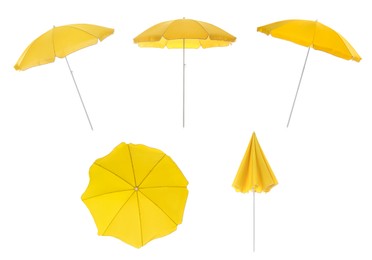 Image of Set with yellow beach umbrellas on white background 