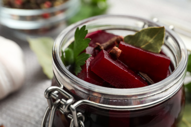 Delicious pickled beets in jar, closeup view