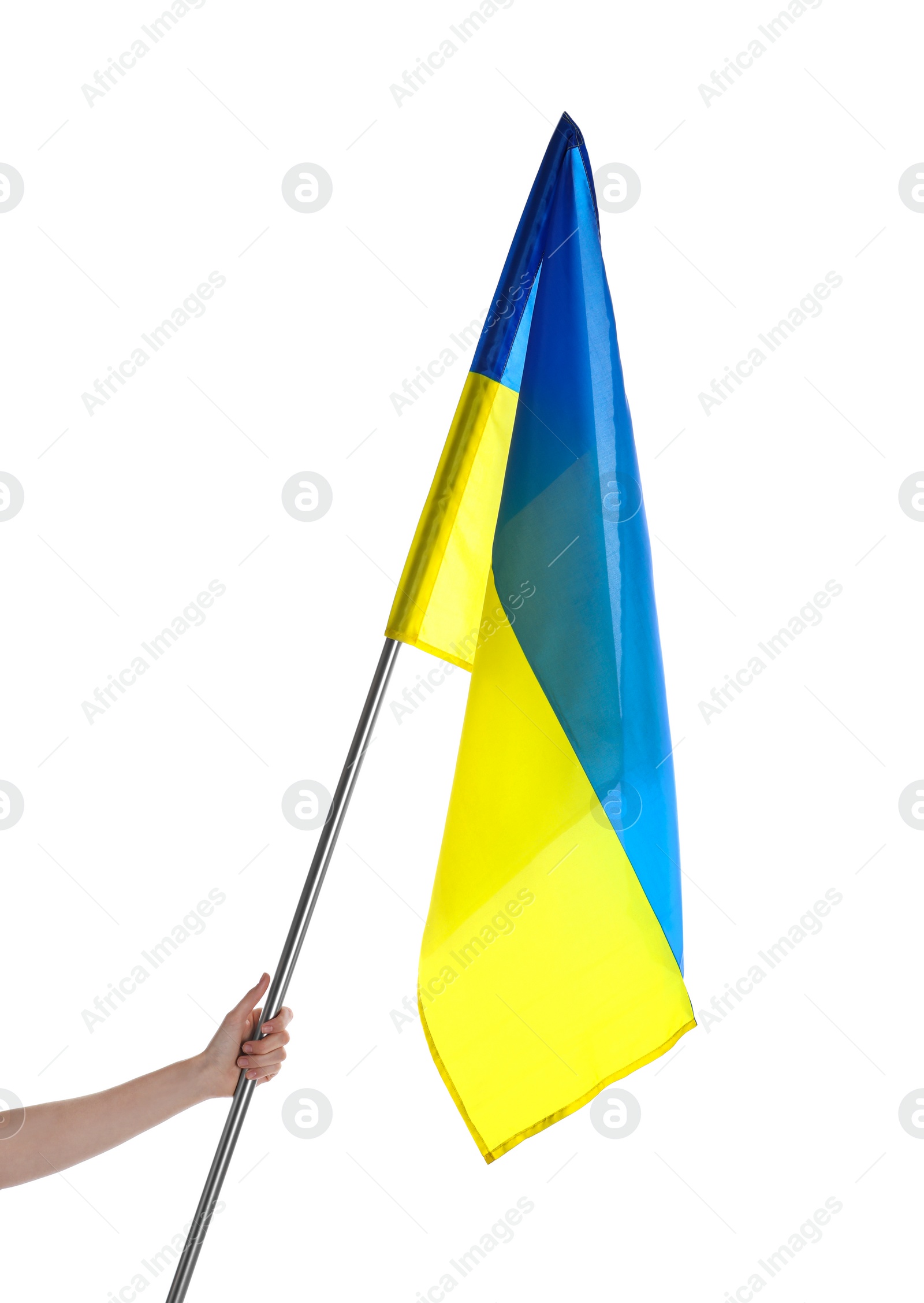 Photo of Woman holding national flag of Ukraine on white background, closeup