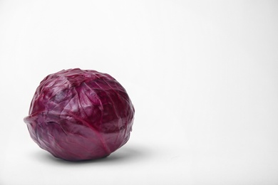 Whole ripe red cabbage on white background