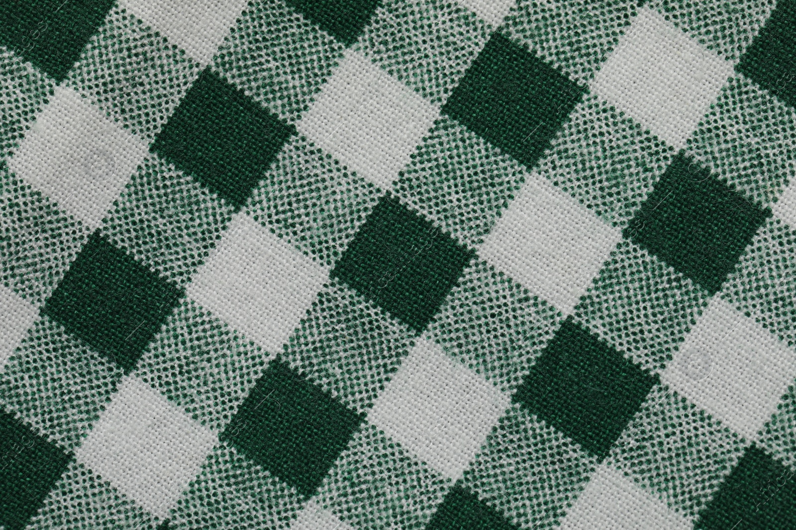 Photo of Texture of checkered fabric as background, top view