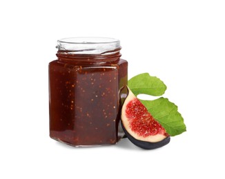 Photo of Glass jar with tasty sweet jam, green leaf and fresh fig isolated on white