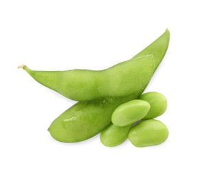 Fresh green edamame pods with beans on white background, top view