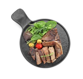 Photo of Delicious grilled beef meat, vegetables and greens isolated on white, top view