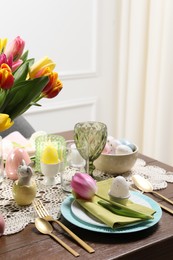 Photo of Festive table setting with beautiful flowers. Easter celebration