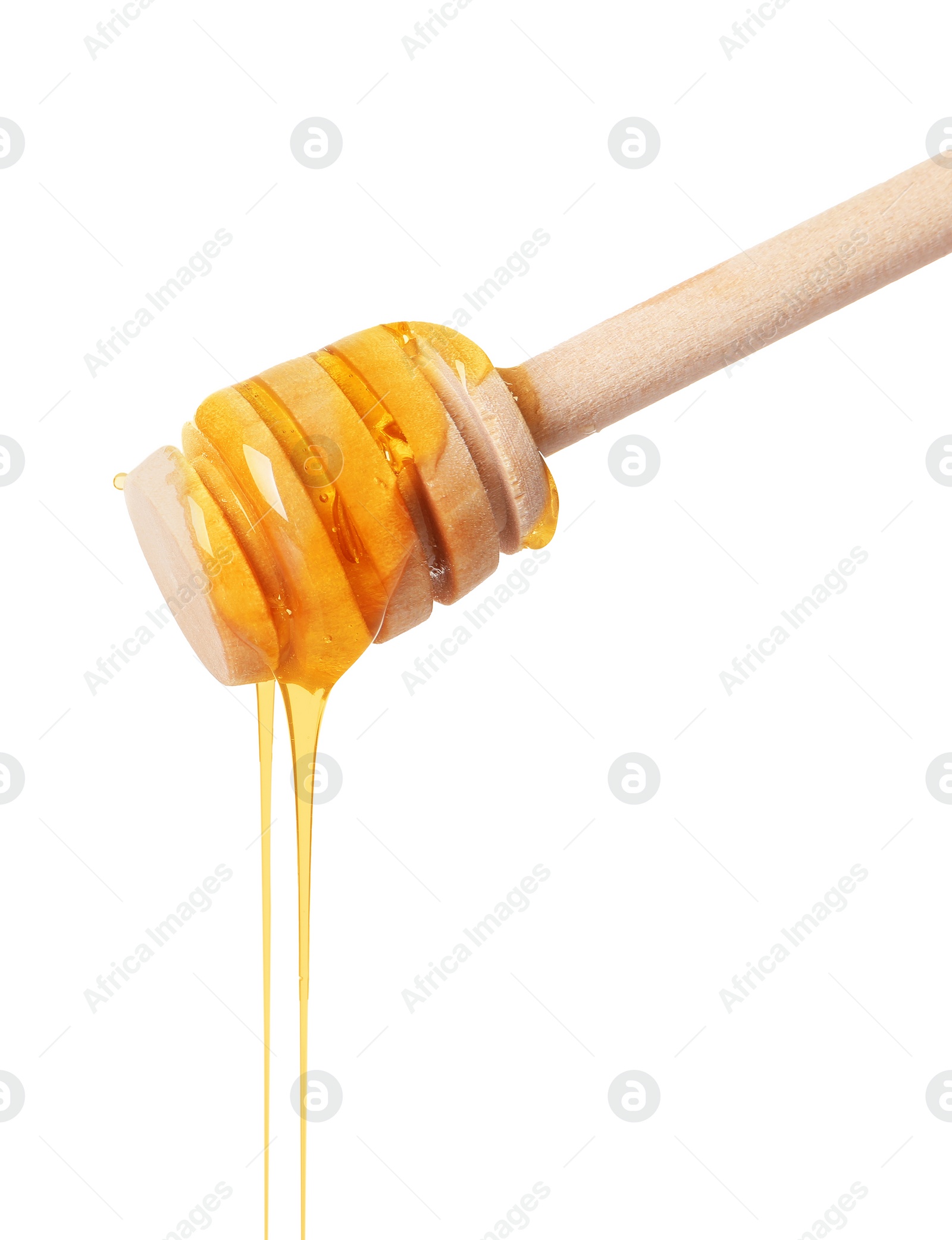 Photo of Fresh honey dripping from dipper on white background