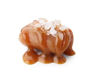 Yummy candy with caramel sauce and sea salt isolated on white