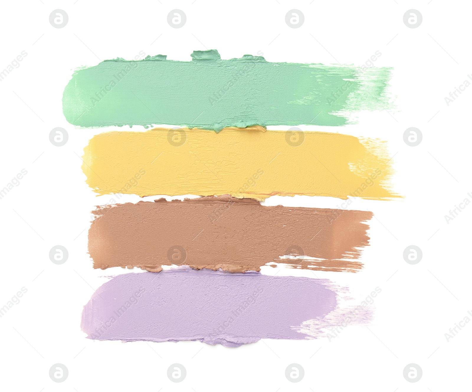 Photo of Samples of color correcting concealers isolated on white, top view